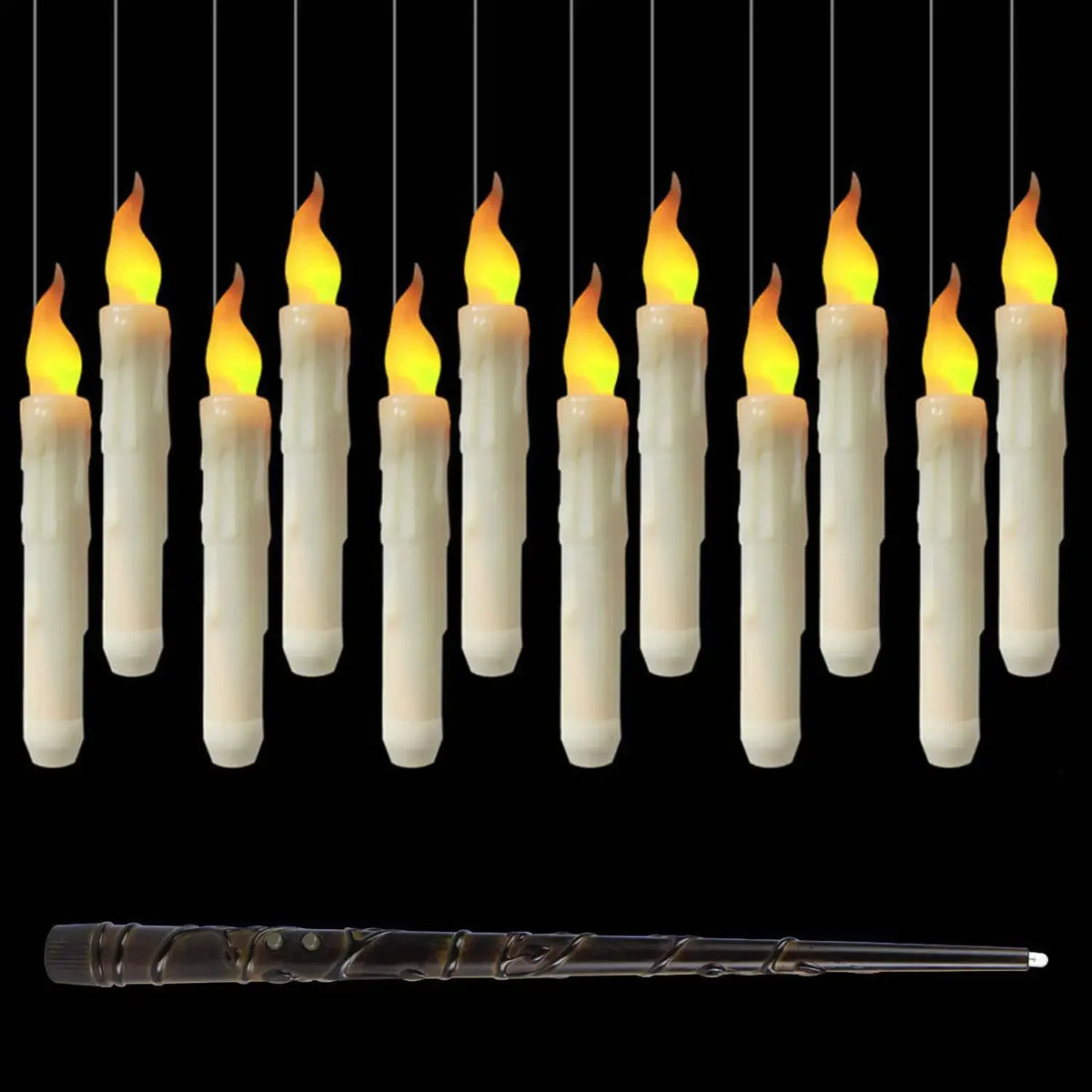 Floating LED candles hanging lit against a black background
