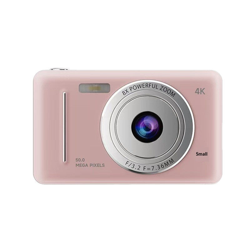 Retro digital camera in pink