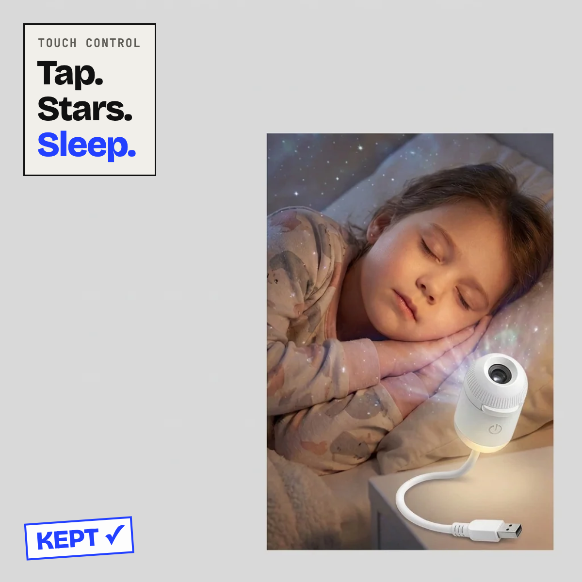 Child asleep under the galaxy projector