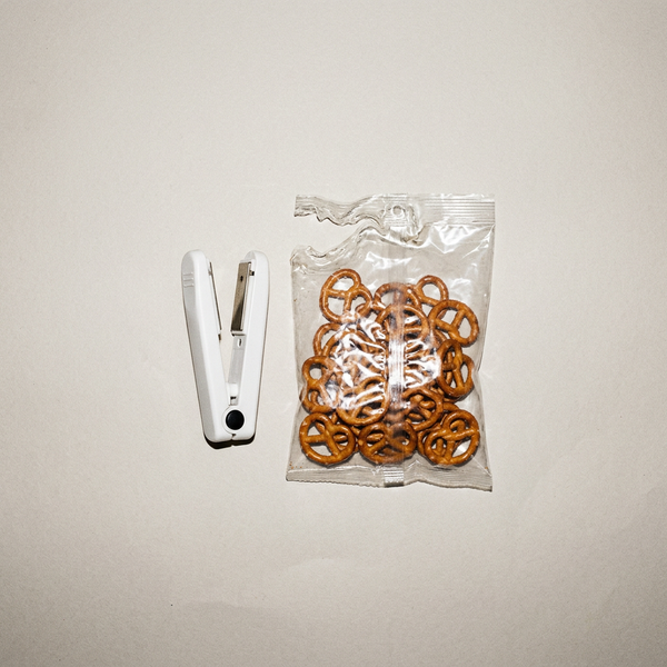 Bag sealer next to a half-sealed bag