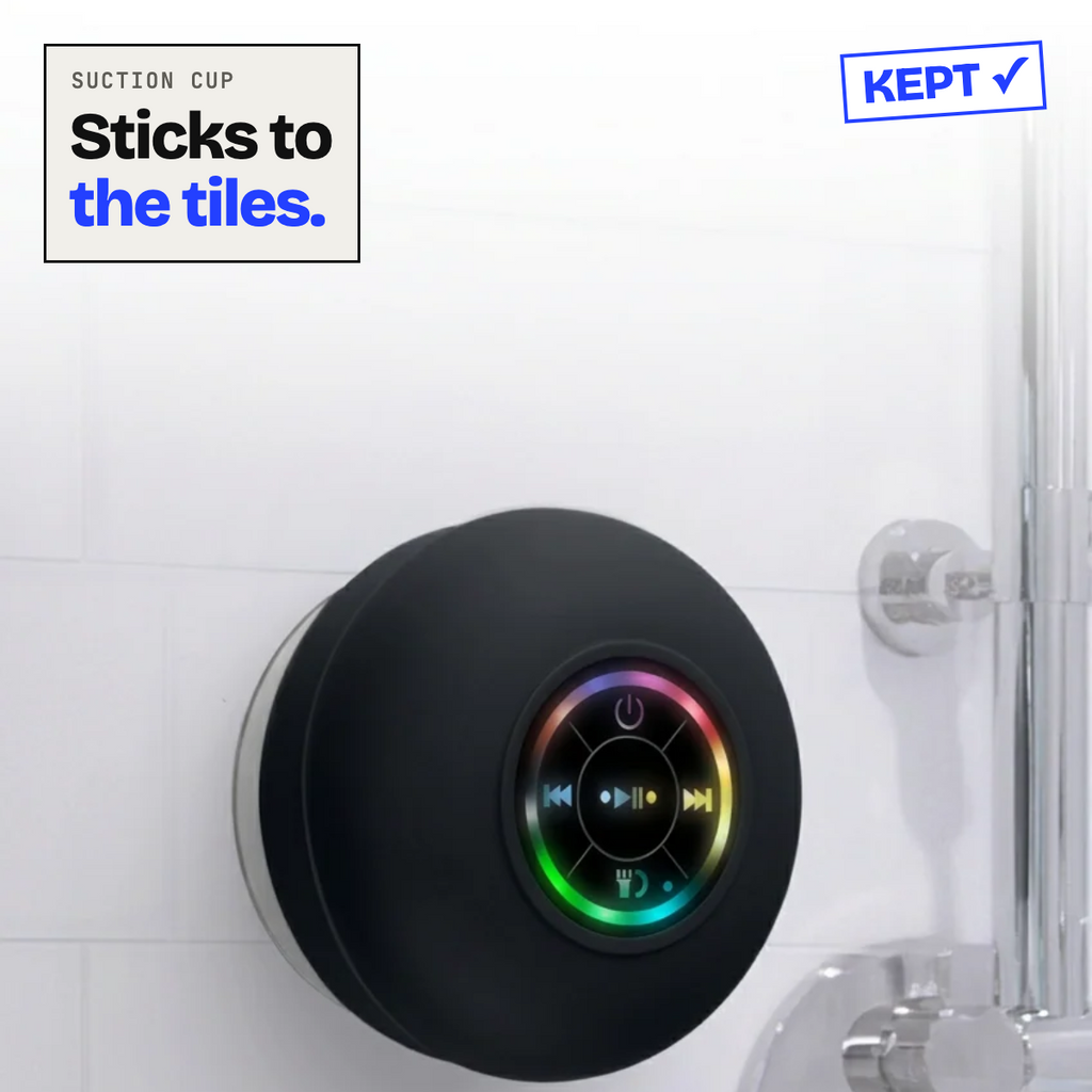 Suction speaker stuck to a bathroom wall