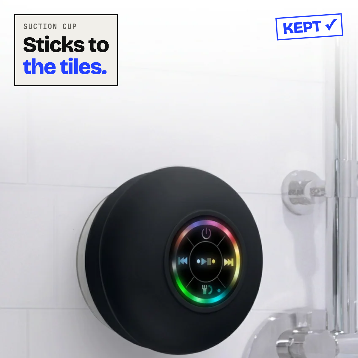 Suction speaker stuck to a bathroom wall